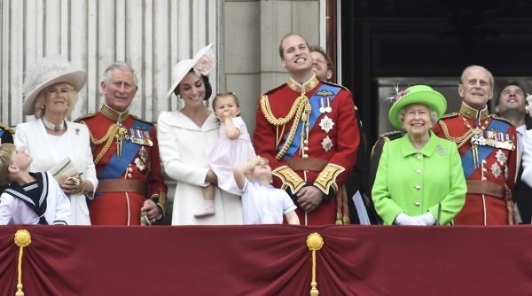 Senior members of the royal family stand on the balcony of Buckingham Palace in central London
