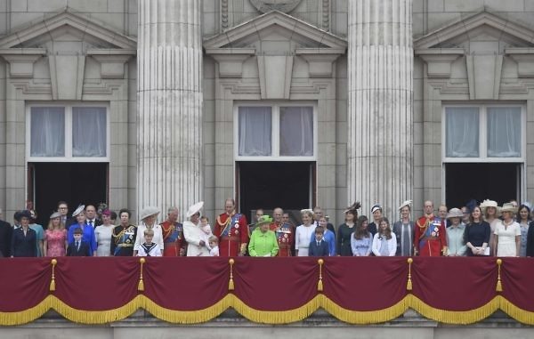 Members of the royal family stand on the balcony of Buckingham Palace in central London