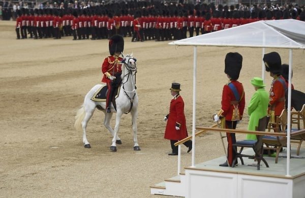 Britain's Queen Elizabeth stands on the dias at Horseguards Parade for the annual Trooping the Colour ceremony in central London