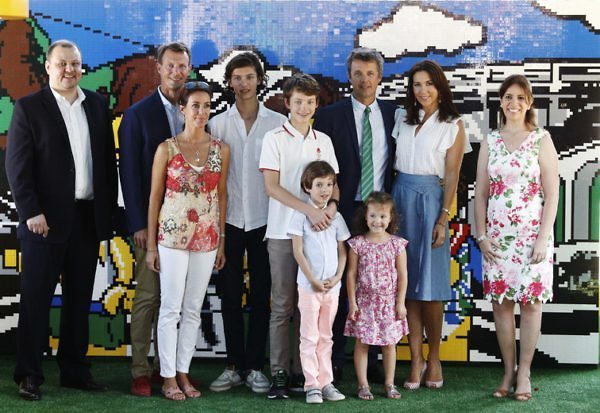 Denmark's Prince Joachim (2nd L), Princess Marie (L), Crown Prince Frederik (3rd R) and Crown Princess Mary (2nd R) pose for a photo with their children at the opening of the Danish Pavillion in Rio de Janeiro, Brazil August 2, 2016. REUTERS/Stoyan Nenov